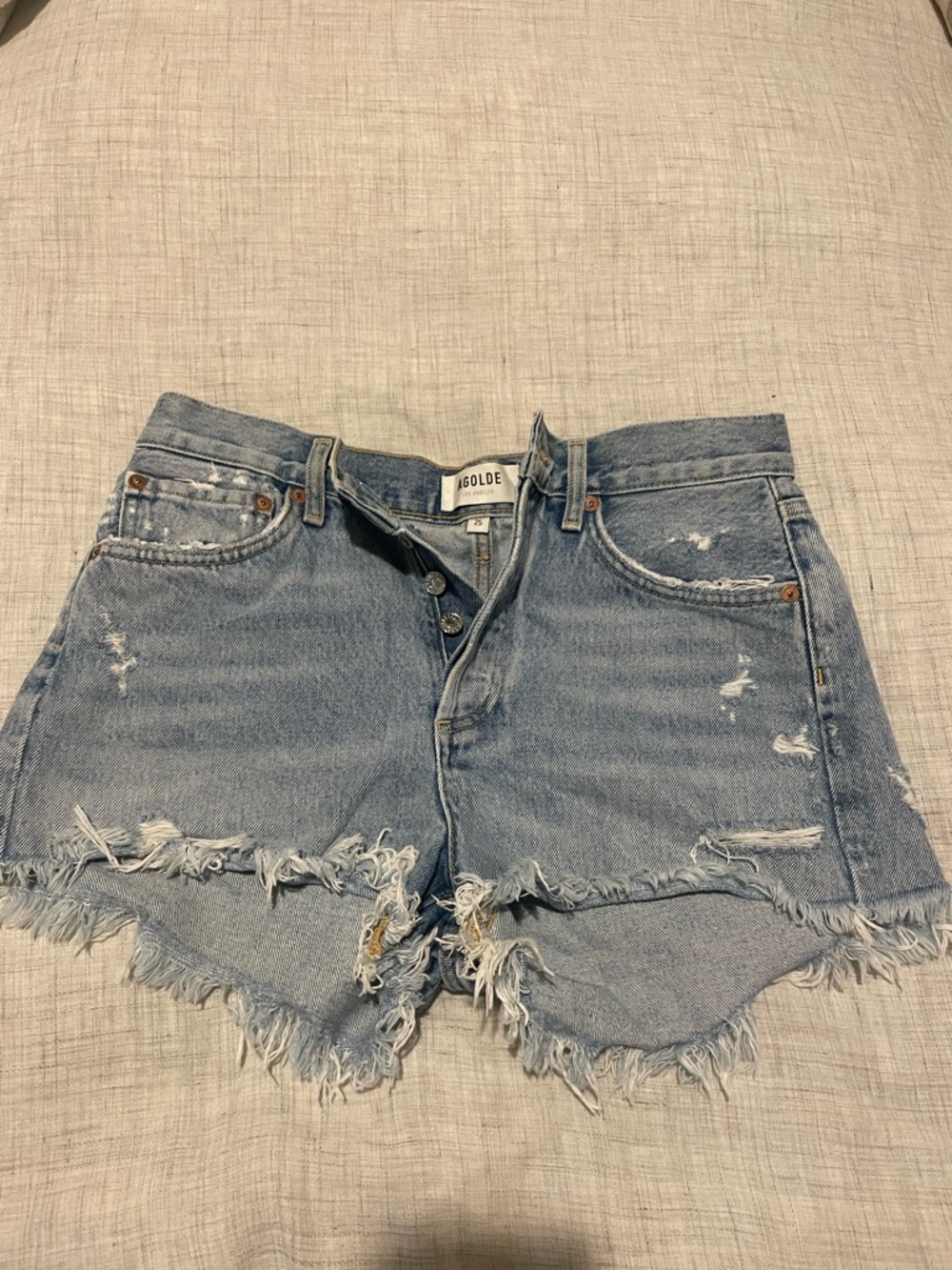 Agolde Distressed Light Wash Denim Cutoff Shorts